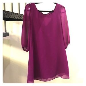 Sheer sleeved purple dress with bow detail on back